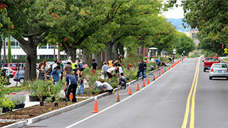 Urban Eden students installing the Tower Road bioswale in 2014.