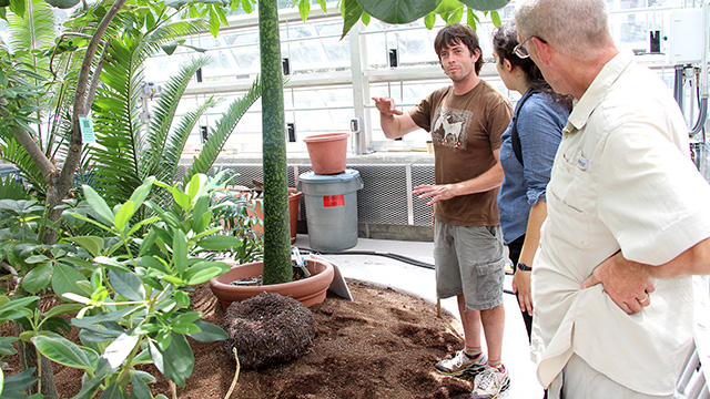 Paul Cooper shows titan arum corm to conference attendees.